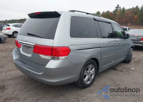 2010 Honda Odyssey Touring из США, поврежденный, VIN 5FNRL3H99AB072501
